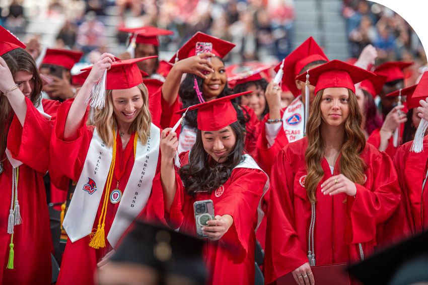 graduates celebrating at commencement